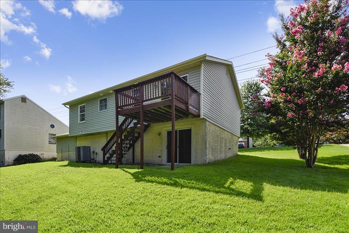 7525 Harmans Road Harmans, MD 21077 - Photo 24 of 30 Deck with Stairs and Walk-Out Lower Level