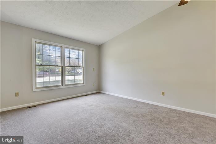 7525 Harmans Road Harmans, MD 21077 - Photo 8 of 30 Living Room with vaulted ceiling