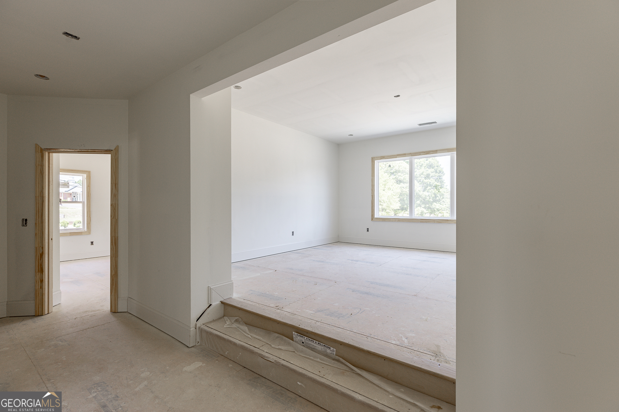 2969 North Bogan Road Northeast, Unit 1 Buford, GA 30519 - Photo 30 of 51 a view of an empty room and window