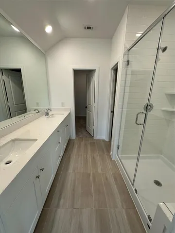 a kitchen with stainless steel appliances granite countertop a stove a sink and a granite counter tops