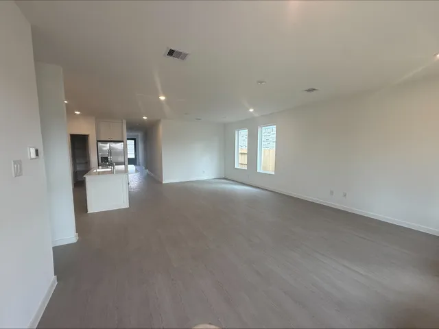 a kitchen that has a stove and a sink