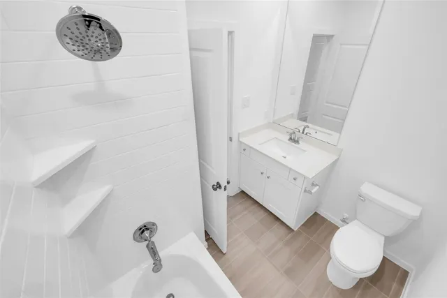 a spacious bathroom with a double vanity sink a mirror and a shower