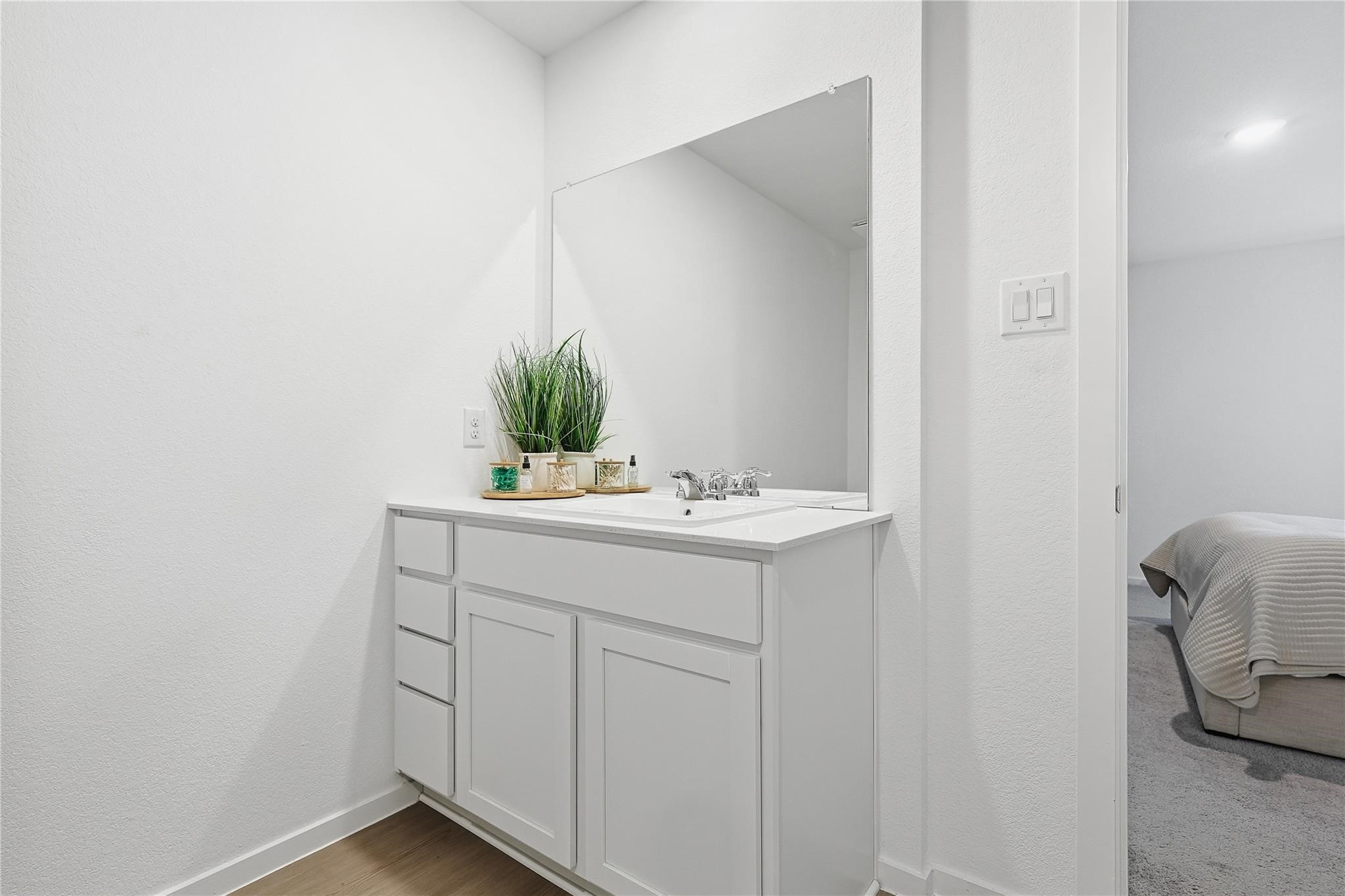 1135 Rustic Willow Drive Beasley, TX 77417 - Photo 11 of 20 a bathroom with a sink and a mirror