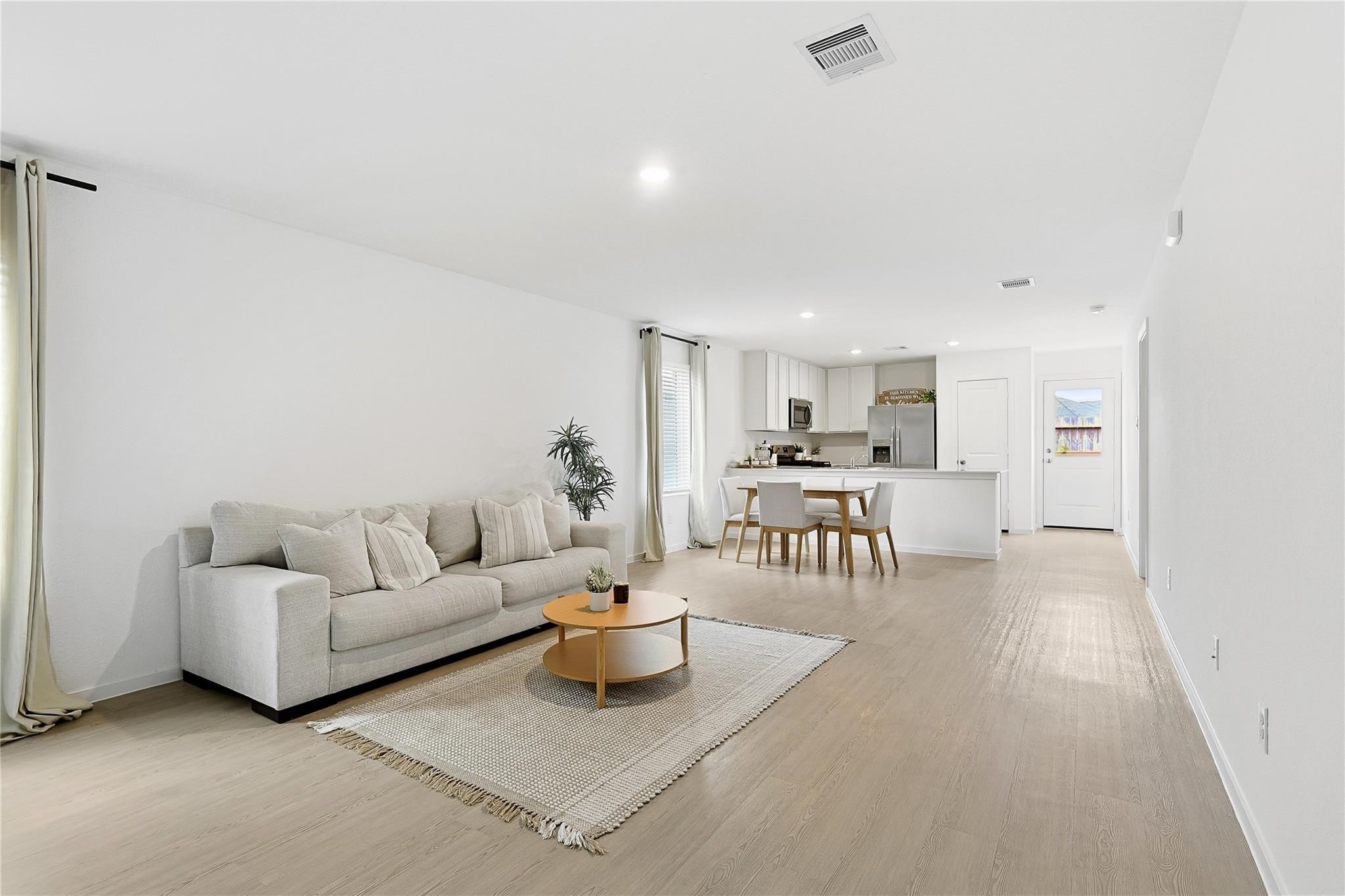 1135 Rustic Willow Drive Beasley, TX 77417 - Photo 4 of 20 a living room with furniture and a table