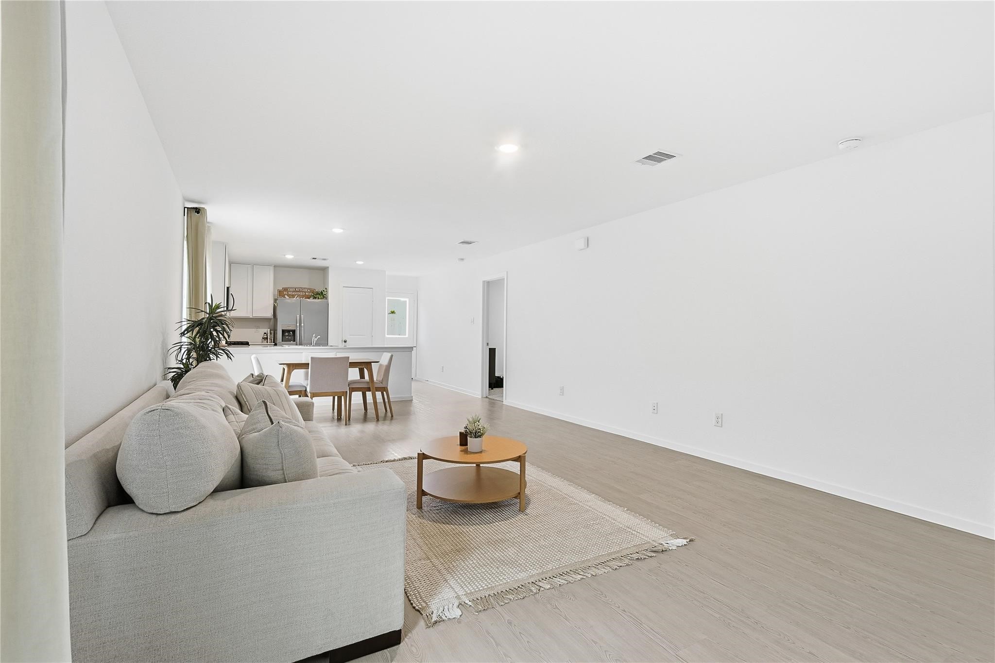 1135 Rustic Willow Drive Beasley, TX 77417 - Photo 5 of 20 a living room with furniture and a table