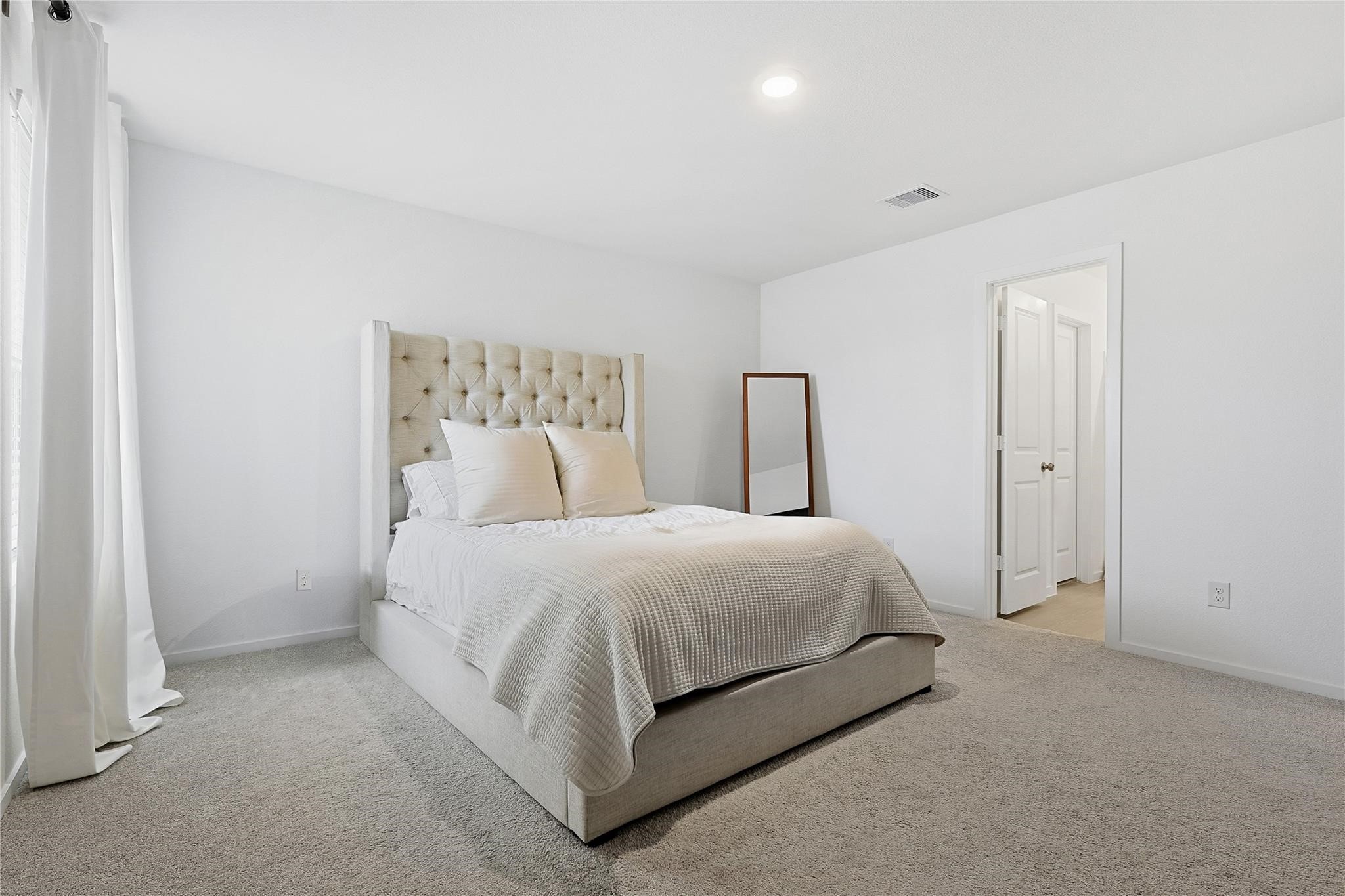 1135 Rustic Willow Drive Beasley, TX 77417 - Photo 9 of 20 a bed room with a bed and a night stand