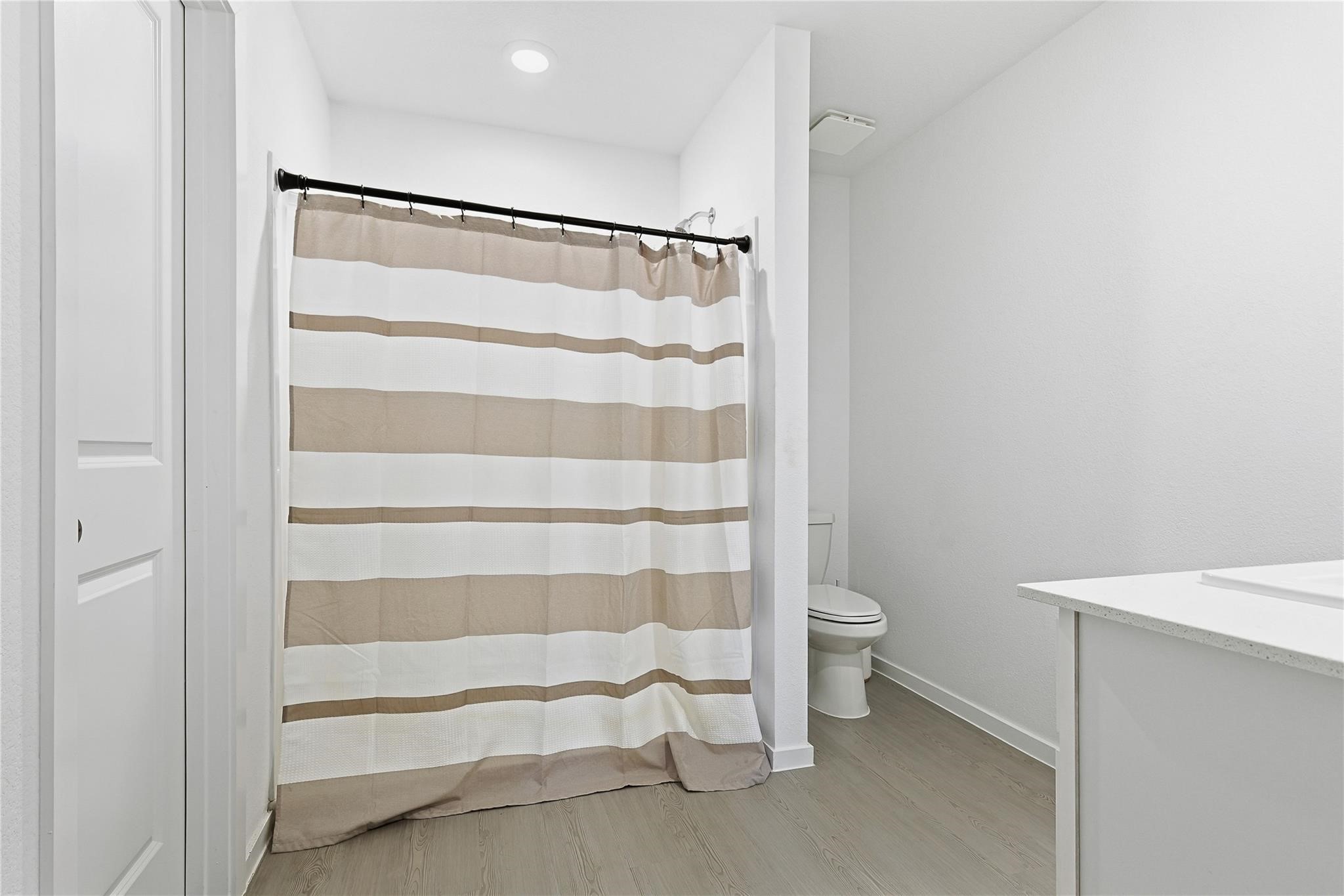 1135 Rustic Willow Drive Beasley, TX 77417 - Photo 10 of 20 a bathroom with a toilet and a shower