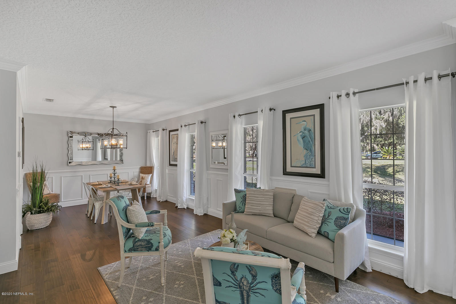 100 River's Edge Road North St. Augustine, FL 32092 - Photo 12 of 67 a living room with furniture and a large window