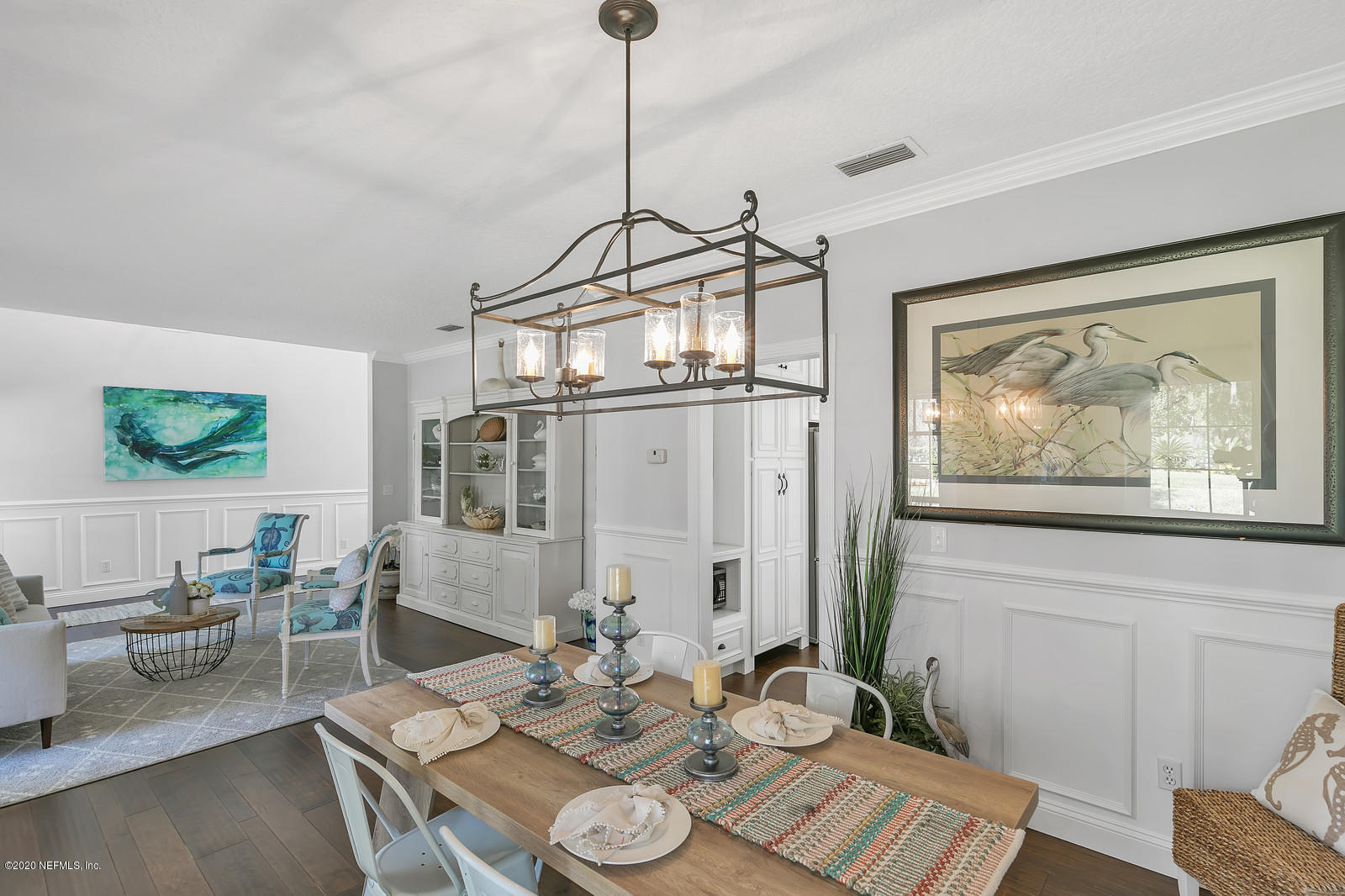 100 River's Edge Road North St. Augustine, FL 32092 - Photo 16 of 67 a view of a dining room with furniture window and wooden floor