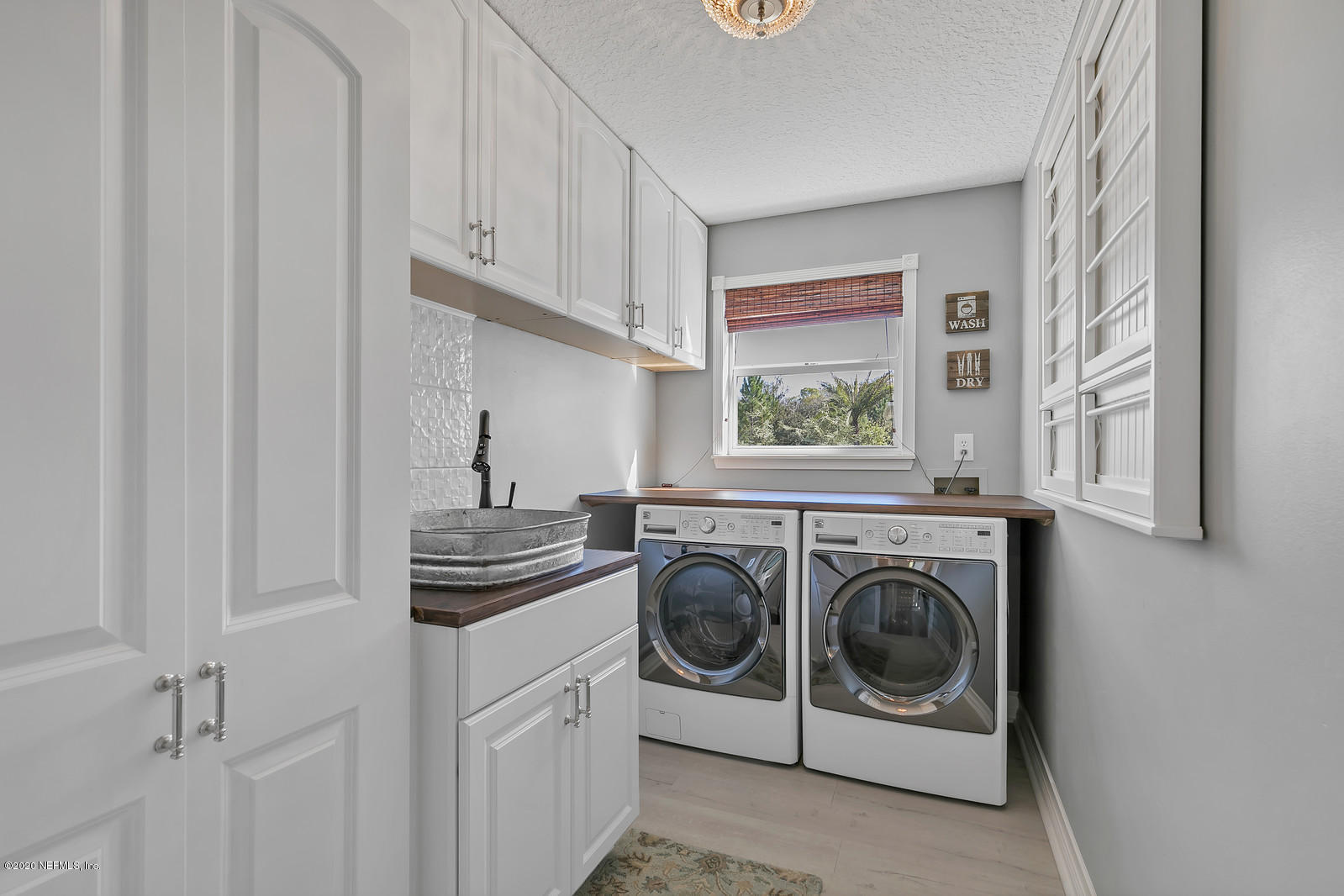 100 River's Edge Road North St. Augustine, FL 32092 - Photo 19 of 67 a utility room with dryer and washer