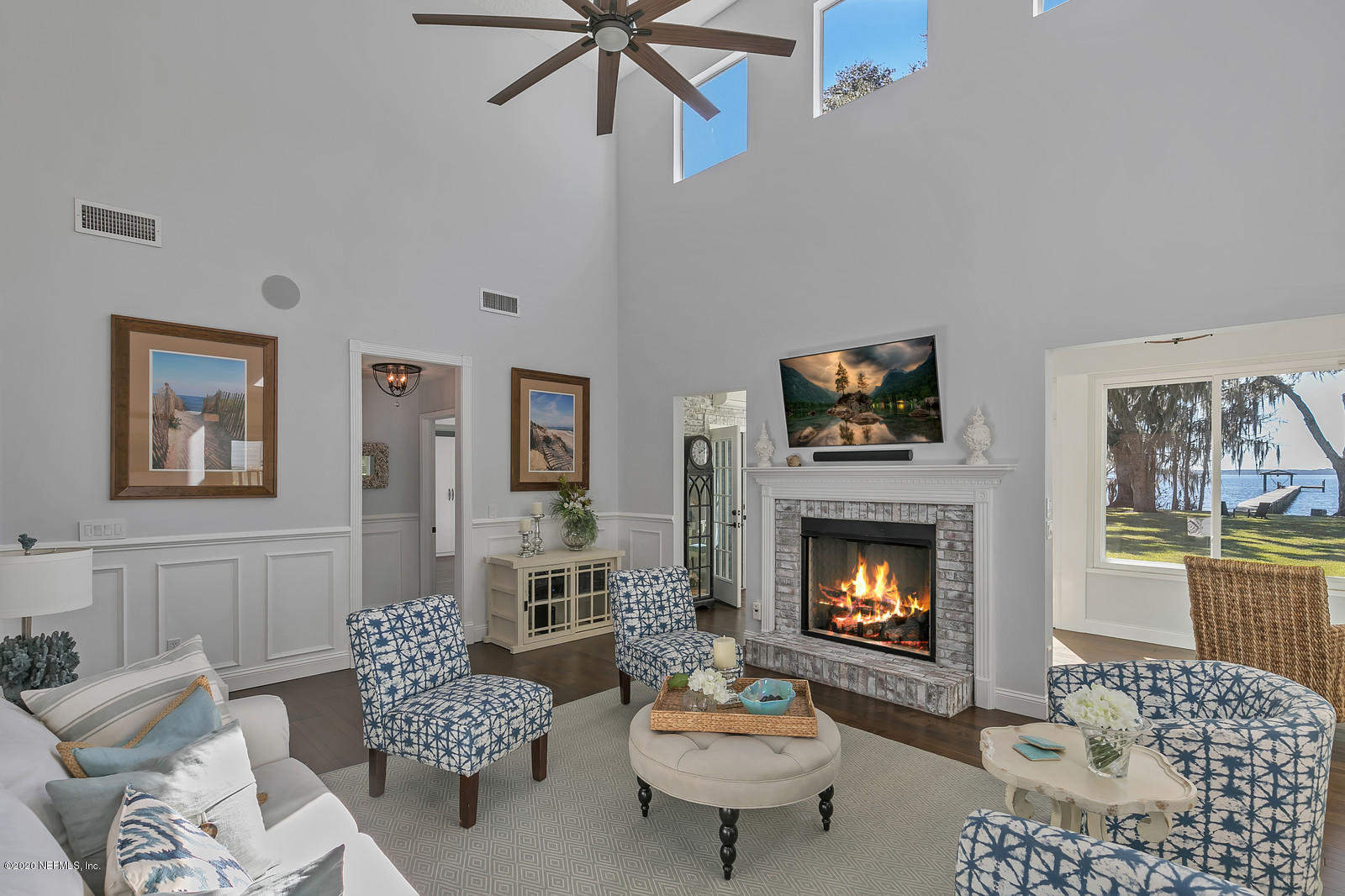100 River's Edge Road North St. Augustine, FL 32092 - Photo 23 of 67 a living room with furniture and a fireplace