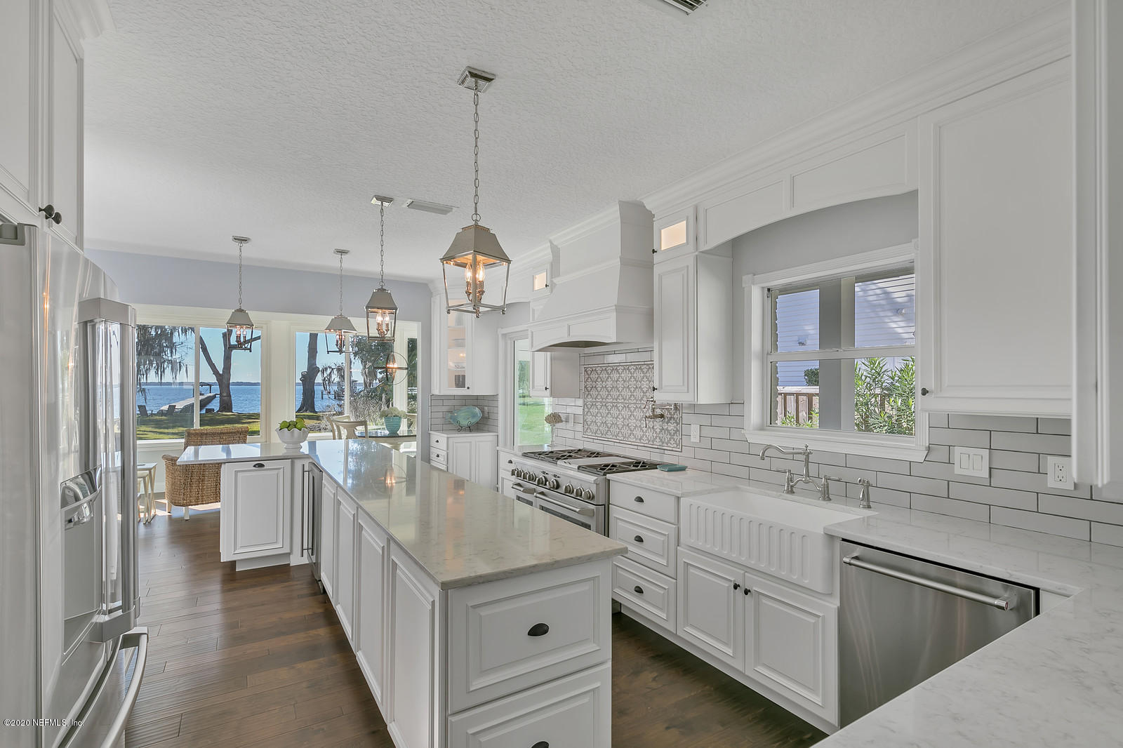 100 River's Edge Road North St. Augustine, FL 32092 - Photo 27 of 67 a kitchen with stainless steel appliances granite countertop a sink a stove and refrigerator