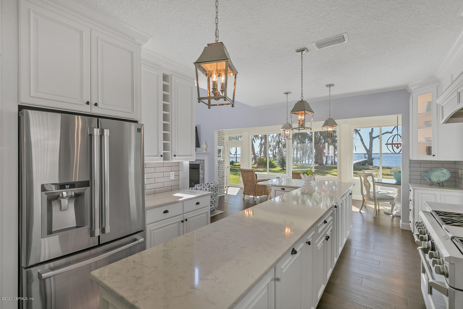 100 River's Edge Road North St. Augustine, FL 32092 - Photo 28 of 67 a kitchen with stainless steel appliances granite countertop a refrigerator a oven a sink and a refrigerator