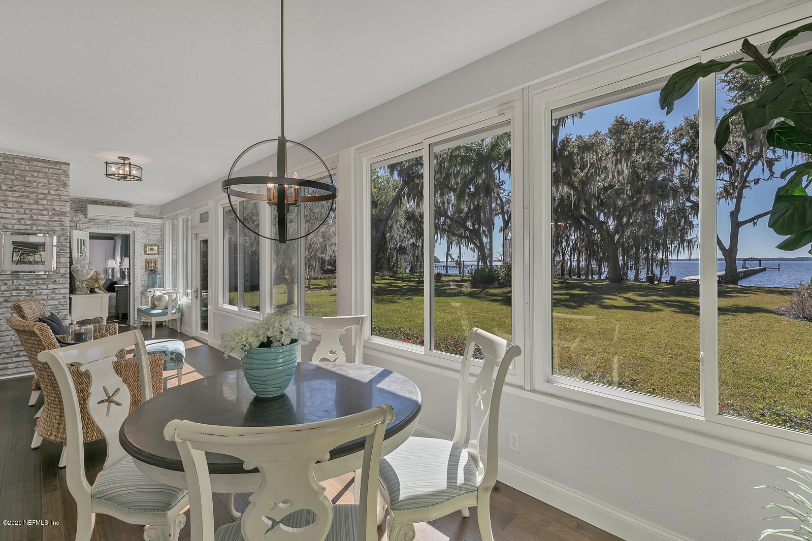 100 River's Edge Road North St. Augustine, FL 32092 - Photo 34 of 67 a dining room with furniture water view and a floor to ceiling window