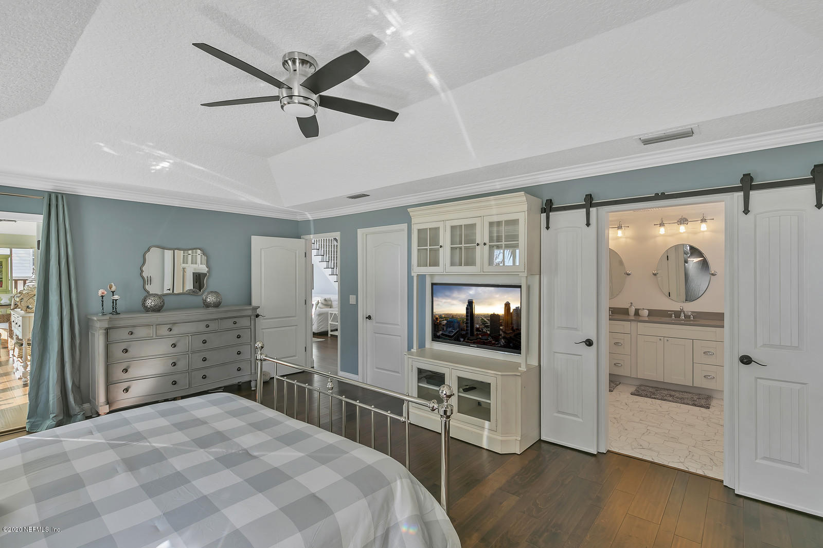 100 River's Edge Road North St. Augustine, FL 32092 - Photo 41 of 67 a bedroom with furniture and a flat screen tv