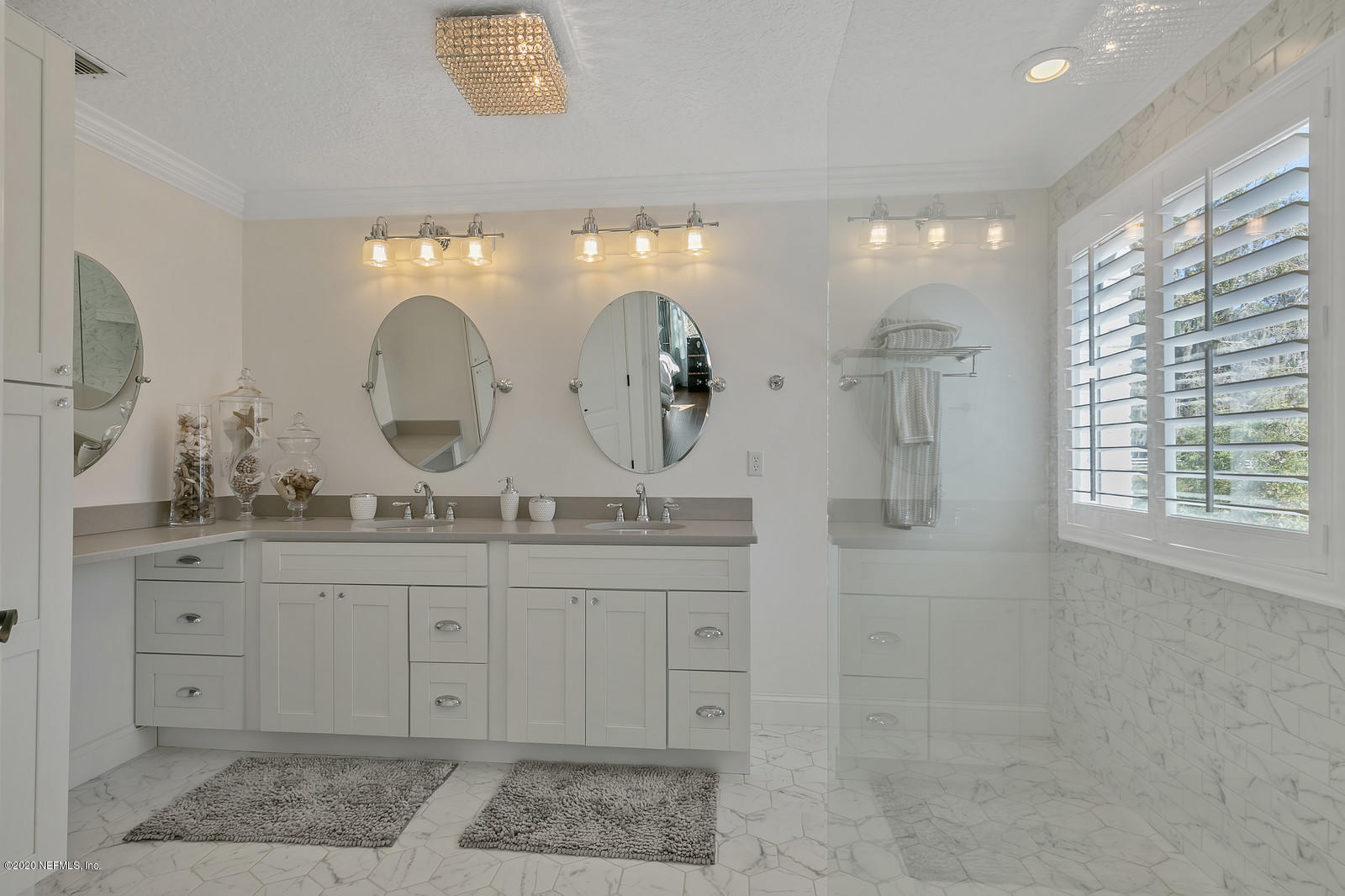 100 River's Edge Road North St. Augustine, FL 32092 - Photo 42 of 67 a bathroom with a granite countertop sink a mirror and shower