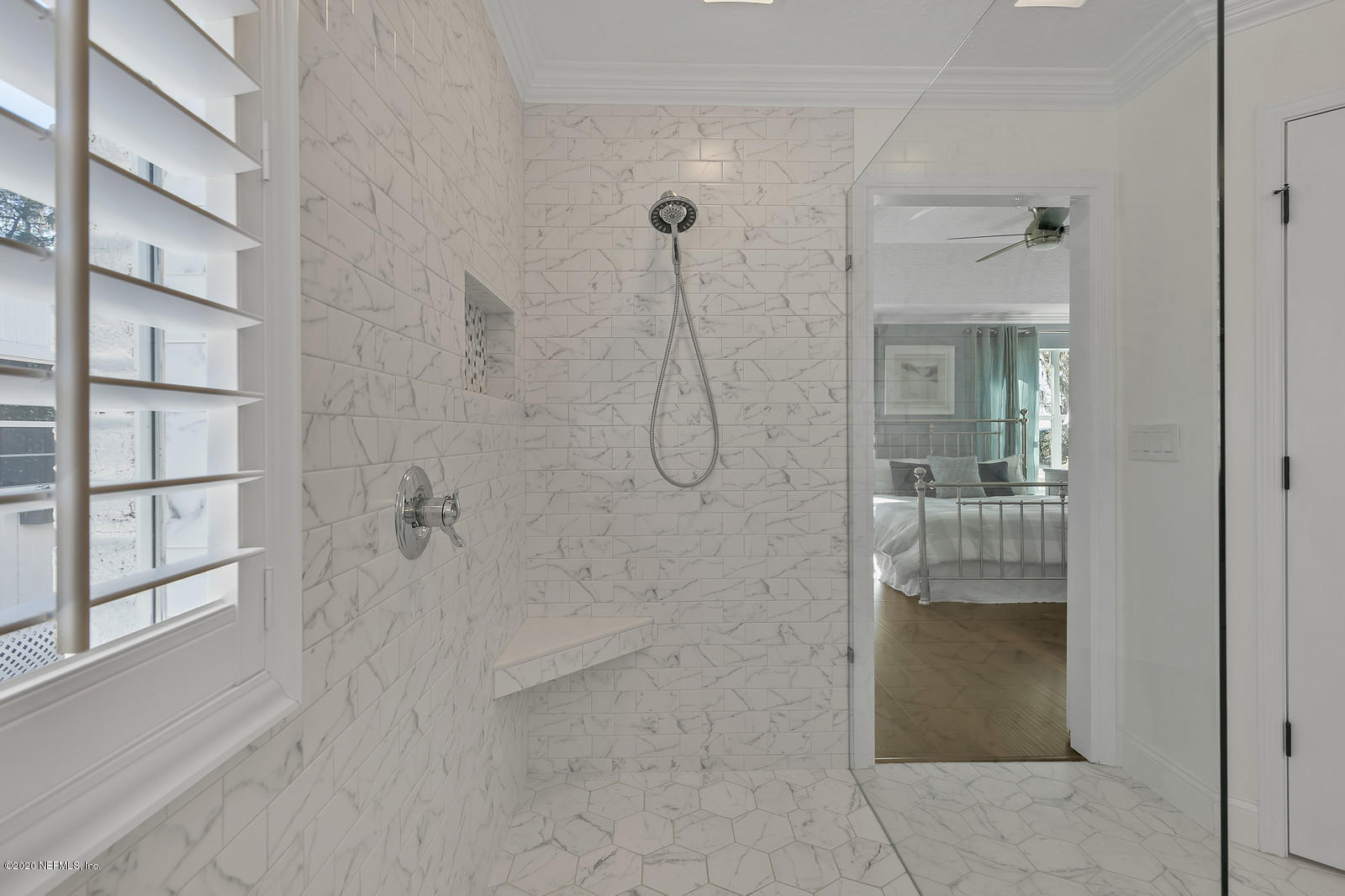 100 River's Edge Road North St. Augustine, FL 32092 - Photo 44 of 67 a bathroom with a glass shower door