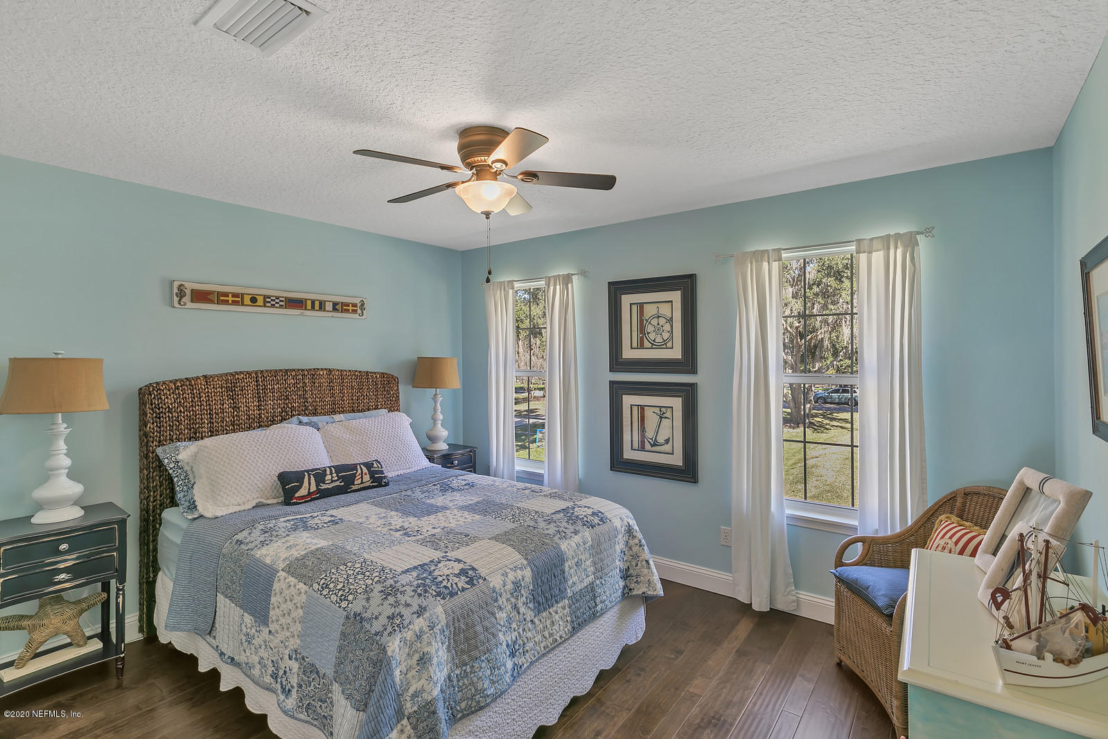 100 River's Edge Road North St. Augustine, FL 32092 - Photo 46 of 67 a bedroom with a large bed and a window
