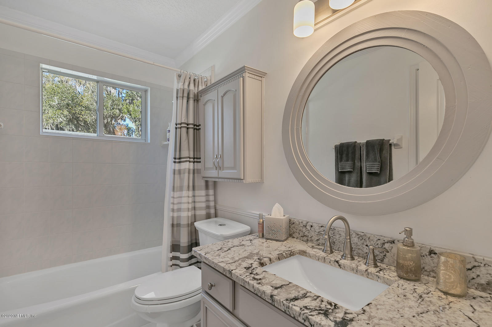 100 River's Edge Road North St. Augustine, FL 32092 - Photo 47 of 67 a bathroom with a granite countertop sink a toilet and a mirror
