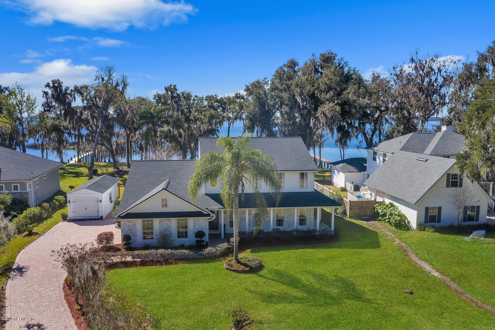 100 River's Edge Road North St. Augustine, FL 32092 - Photo 5 of 67 an aerial view of a house with swimming pool garden and trees