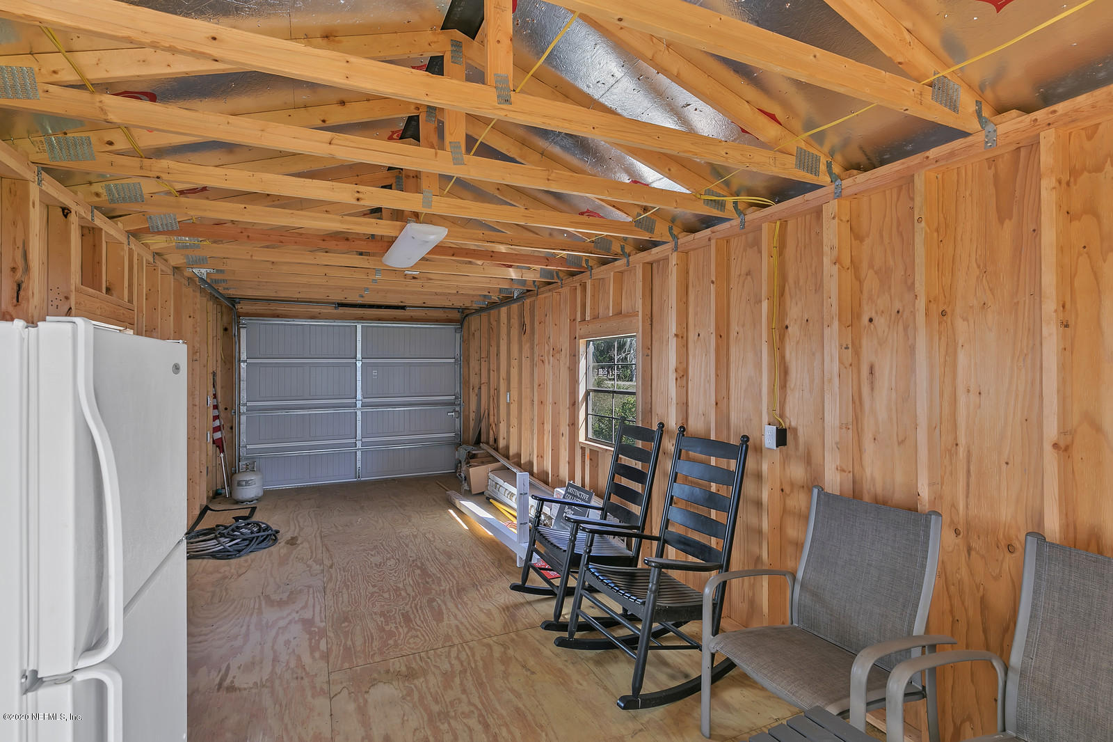 100 River's Edge Road North St. Augustine, FL 32092 - Photo 53 of 67 a view of a room with furniture and a refrigerator