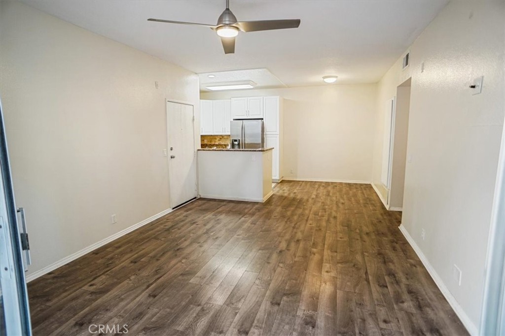 27646 A Susan Beth Way Saugus, CA 91350 - Photo 5 of 12 a view of empty room with wooden floor