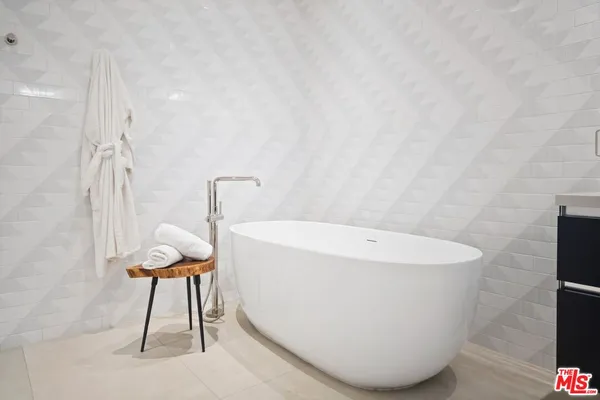 a view of a bathtub in a bathroom