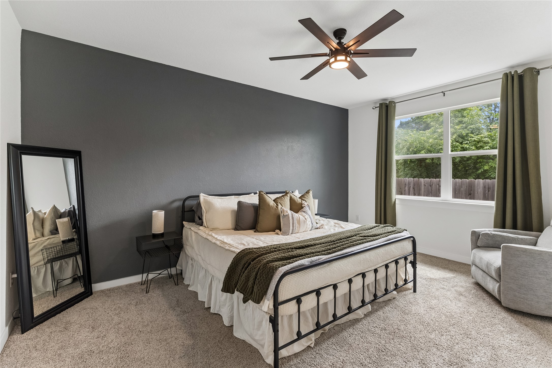 249 Century Plant Road Leander, TX 78641 - Photo 5 of 22 a bedroom with a bed and a large window