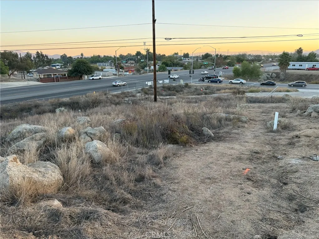 a view of a road with an ocean beach