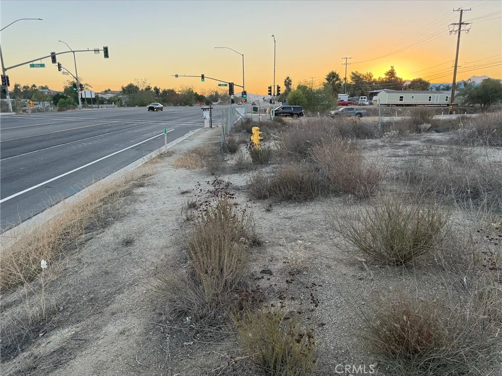 0 State Highway Perris, CA 92570 - Photo 6 of 17 a view of a dry yard with wooden fence