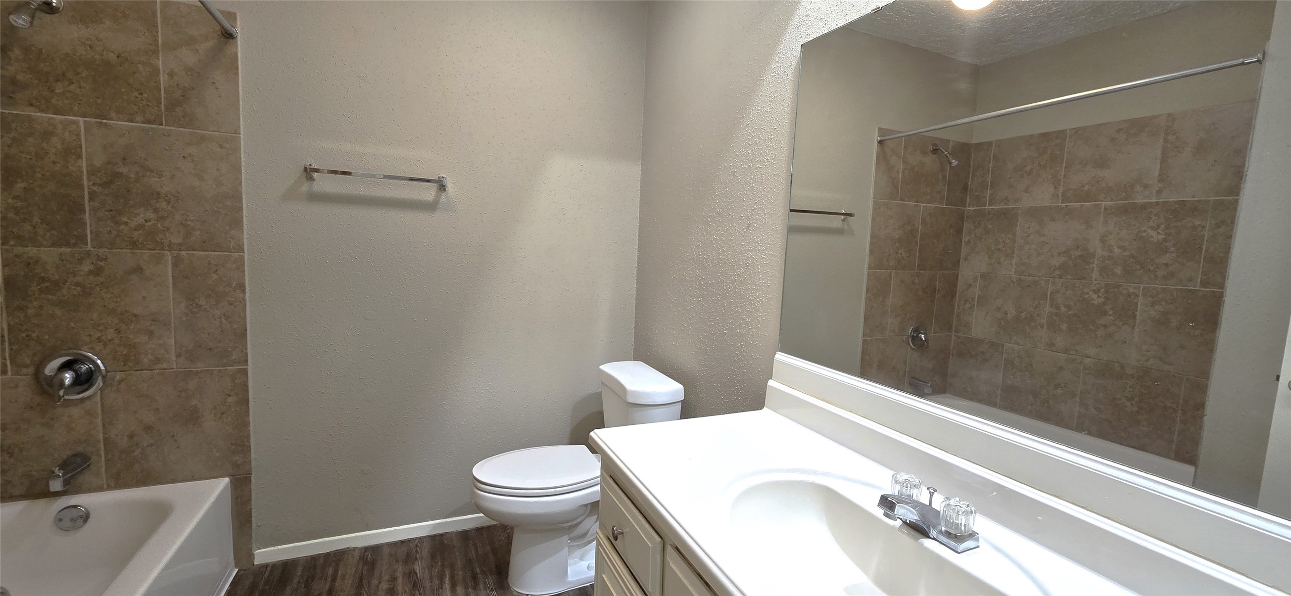 23019 Tree Bright Lane Spring, TX 77373 - Photo 9 of 20 Full size secondary bathroom includes a tub/shower combo featuring beautiful ceramic tile.