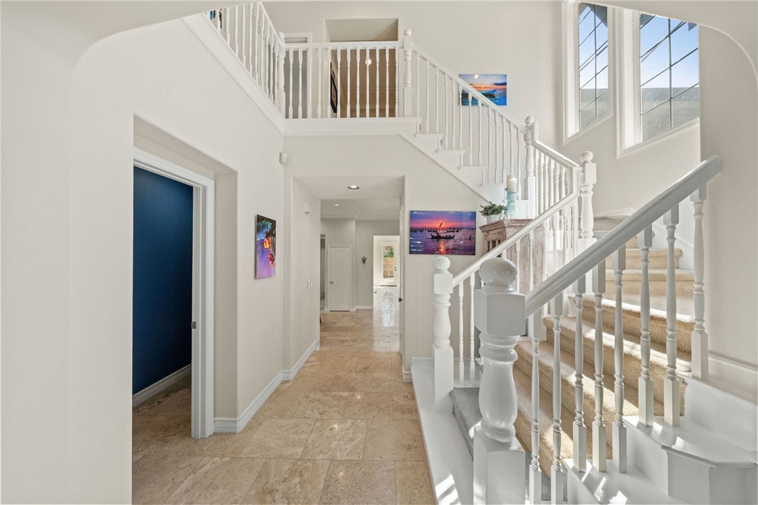 23 Winslow Street Ladera Ranch, CA 92694 - Photo 20 of 47 a view of staircase with white walls and a window