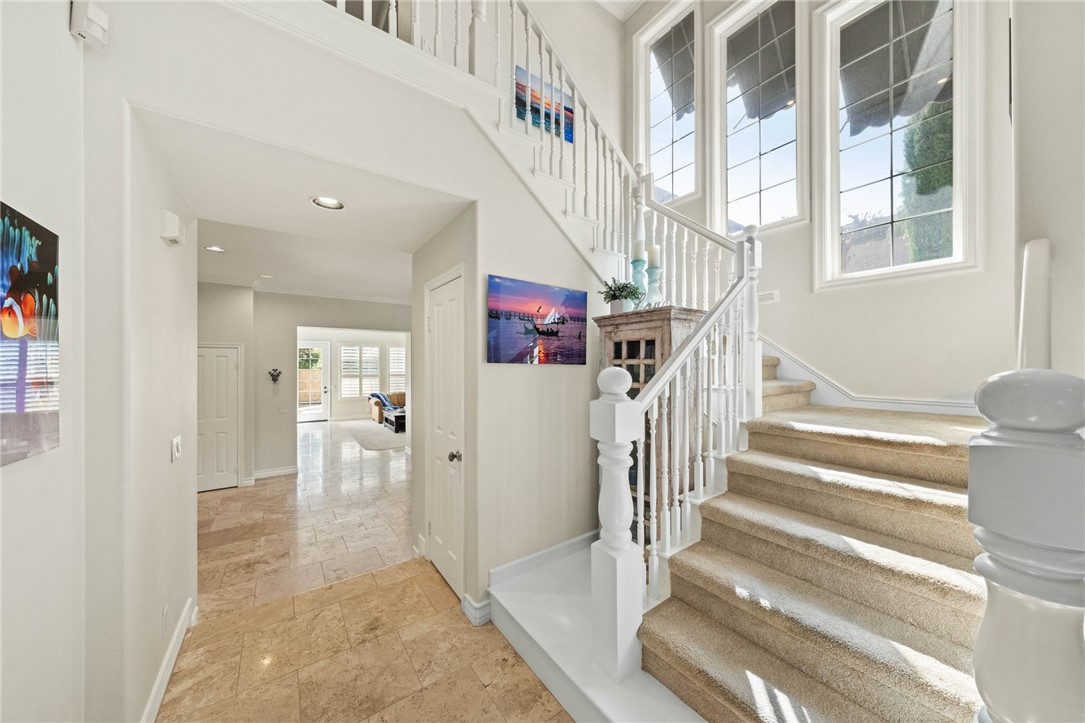 23 Winslow Street Ladera Ranch, CA 92694 - Photo 21 of 47 a view of entryway and hall with wooden floor