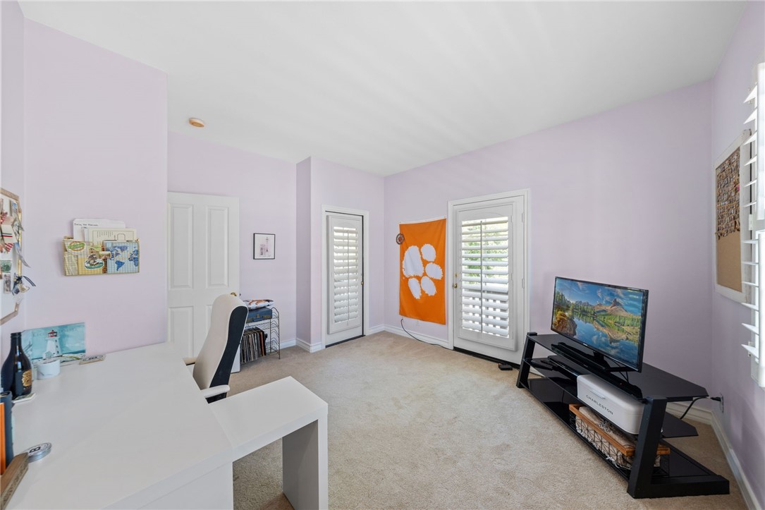 23 Winslow Street Ladera Ranch, CA 92694 - Photo 27 of 47 a living room with furniture and a flat screen tv