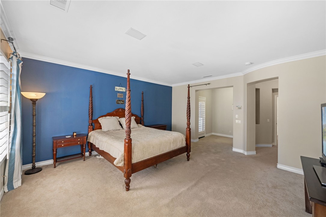 23 Winslow Street Ladera Ranch, CA 92694 - Photo 37 of 47 a bed room with a bed and a closet