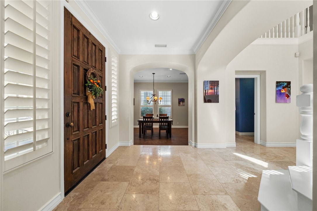23 Winslow Street Ladera Ranch, CA 92694 - Photo 6 of 47 a view of a livingroom with furniture and an entryway
