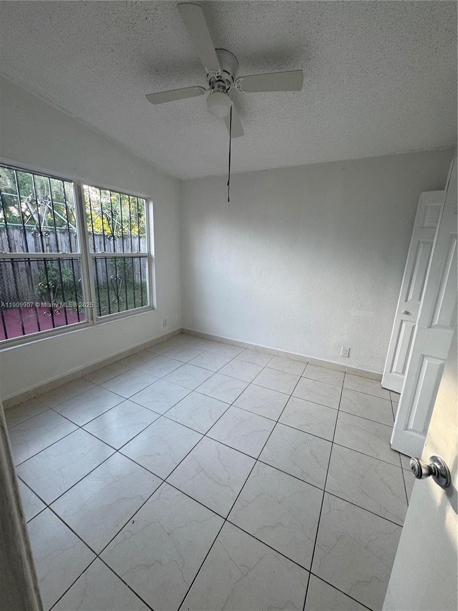 20769 Northwest 41st Avenue Miami Gardens, FL 33055 - Photo 12 of 19 a view of an empty room and a window
