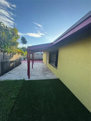a view of outdoor space and yard