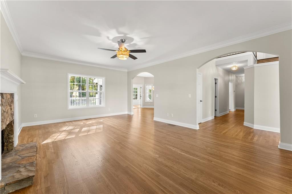 41 Doster Crest Road Jefferson, GA 30549 - Photo 13 of 56 a view of an empty room with a window and wooden floor