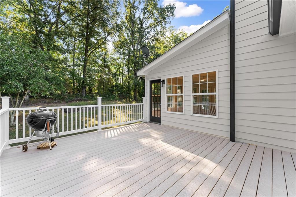 41 Doster Crest Road Jefferson, GA 30549 - Photo 21 of 56 a view of a house with wooden deck
