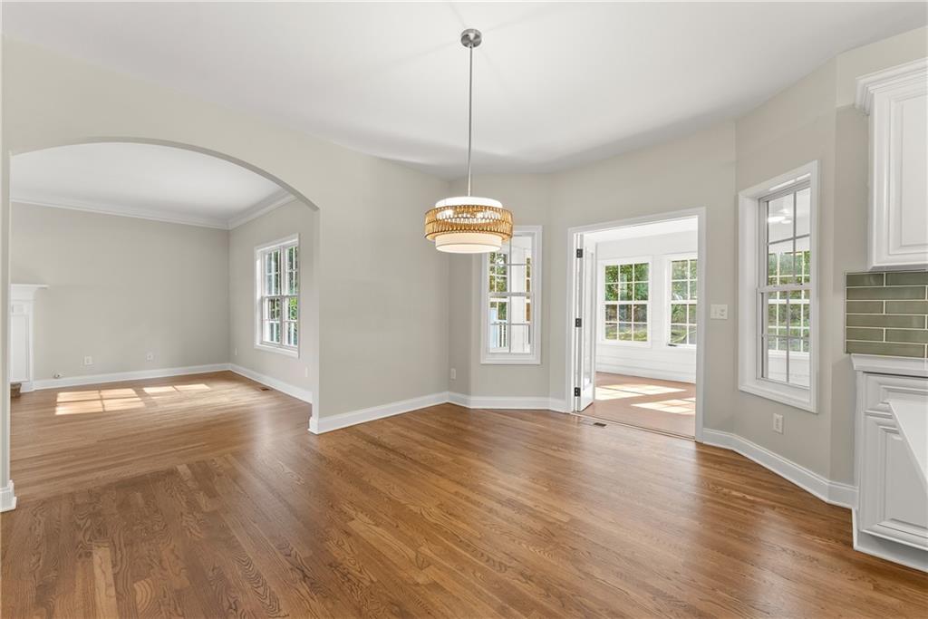 41 Doster Crest Road Jefferson, GA 30549 - Photo 22 of 56 a view of an empty room with wooden floor and a window