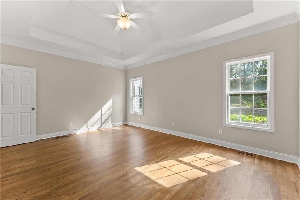 41 Doster Crest Road Jefferson, GA 30549 - Photo 26 of 56 a view of an empty room with wooden floor and a window