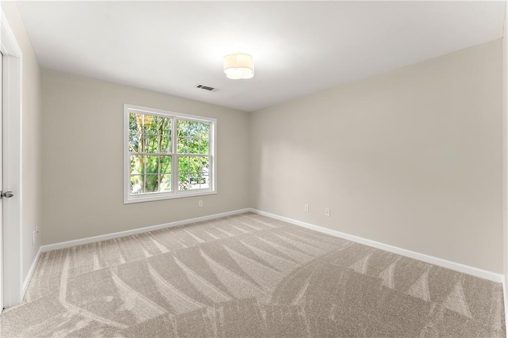 41 Doster Crest Road Jefferson, GA 30549 - Photo 29 of 56 an empty room with a window