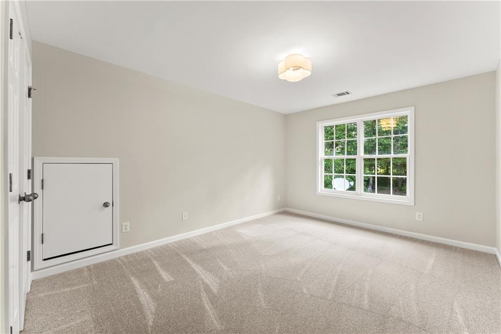 41 Doster Crest Road Jefferson, GA 30549 - Photo 35 of 56 a view of an empty room with a window