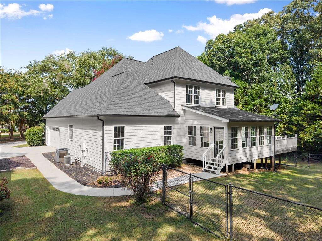 41 Doster Crest Road Jefferson, GA 30549 - Photo 37 of 56 a front view of a house with a yard