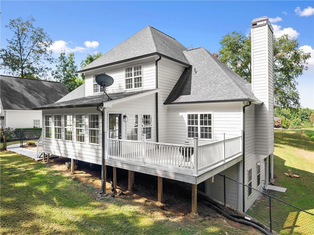 41 Doster Crest Road Jefferson, GA 30549 - Photo 38 of 56 a house with river in front of it