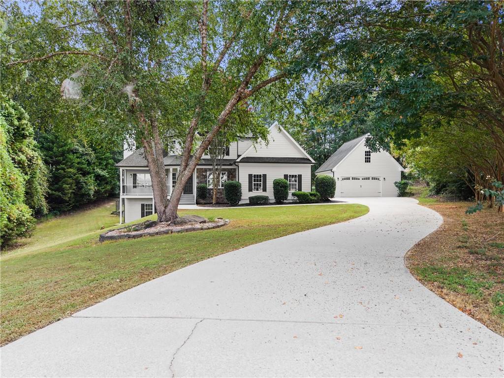 41 Doster Crest Road Jefferson, GA 30549 - Photo 5 of 56 a front view of a house with garden