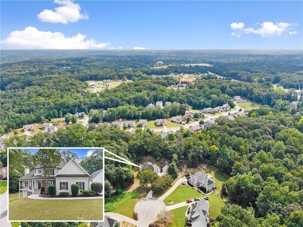 41 Doster Crest Road Jefferson, GA 30549 - Photo 52 of 56 an aerial view of house with yard swimming pool and lake view