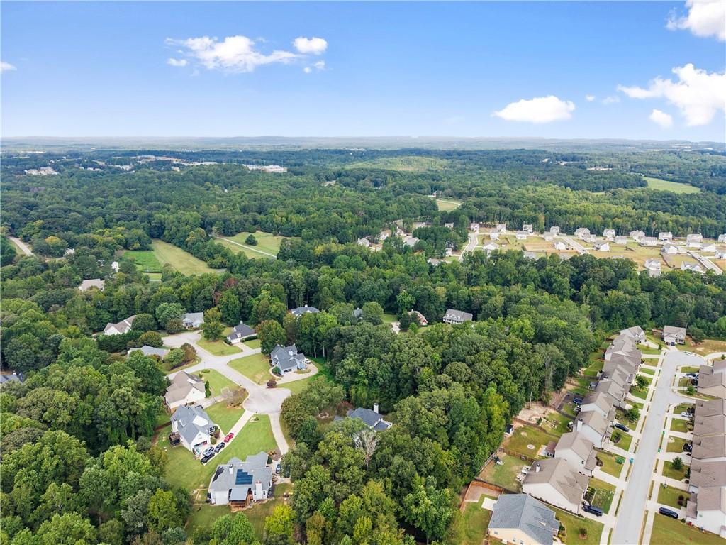 41 Doster Crest Road Jefferson, GA 30549 - Photo 56 of 56 an aerial view of residential houses with outdoor space and trees