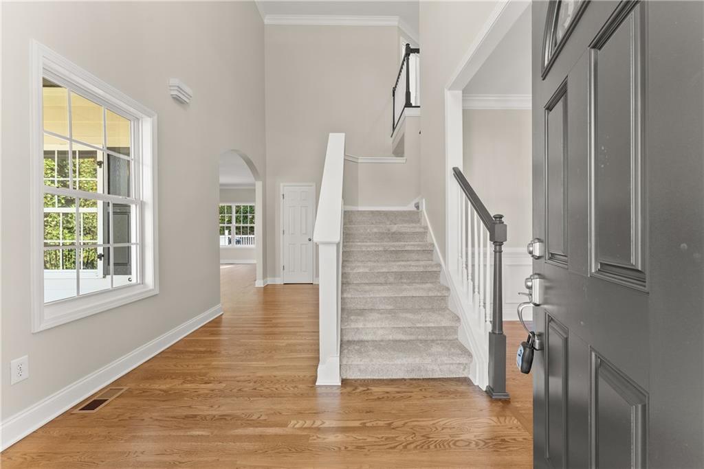 41 Doster Crest Road Jefferson, GA 30549 - Photo 7 of 56 a view of an entryway with wooden floor and windows